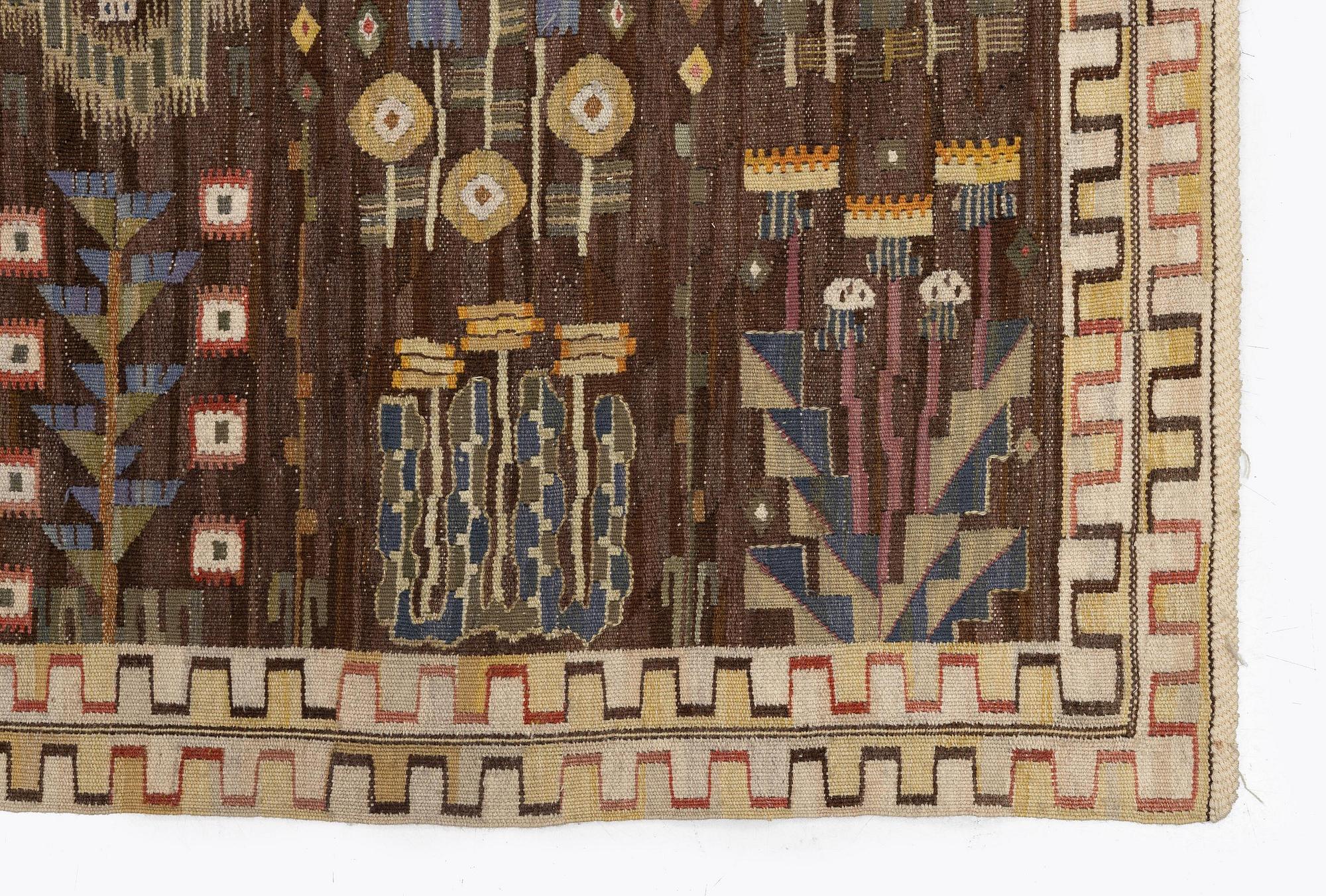 Märta Måås-Fjetterström, a tapestry, 'Juniblommor', tapestry weave, c. 271 x 163 cm, signed MMF.