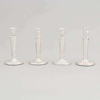 Four Swedish Silver Candlesticks, mark of Tenn & Silver Ab, Gothenburg 1955-56.