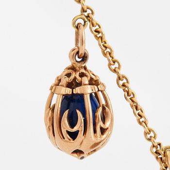 A FABERGÉ  GOLD Chain Necklace WITH 8 GOLD, ENAMEL ETC MINIATURE EASTER EGG PENDANTS, S.T PETERSBURG and 3 other.