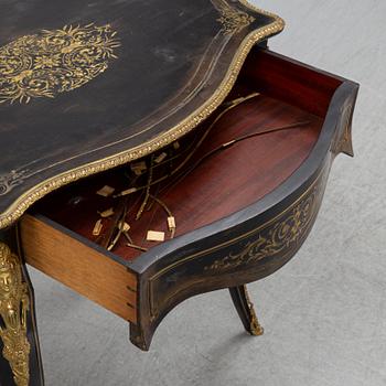 A Louis XV style table, early 20th Century.