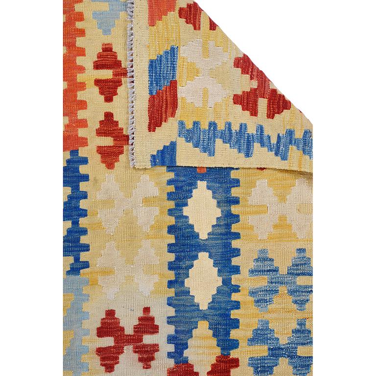 A kilim runner, 285 x 81 cm.
