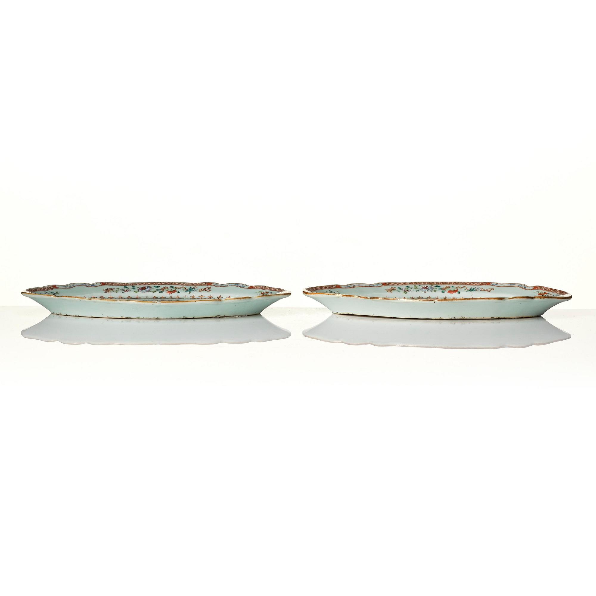 A pair of famille rose 'double peacock' dishes, Qing dynasty, Qianlong (1736-95).