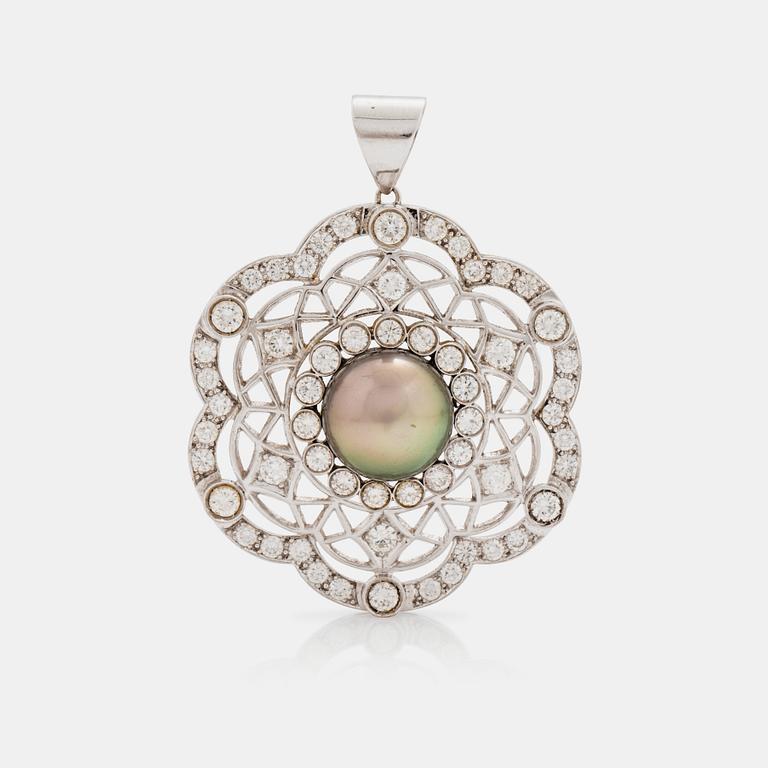 A cultured Tahiti pearl and brilliant cut diamond pendant. Total carat weight of diamonds circa 4.50 cts.