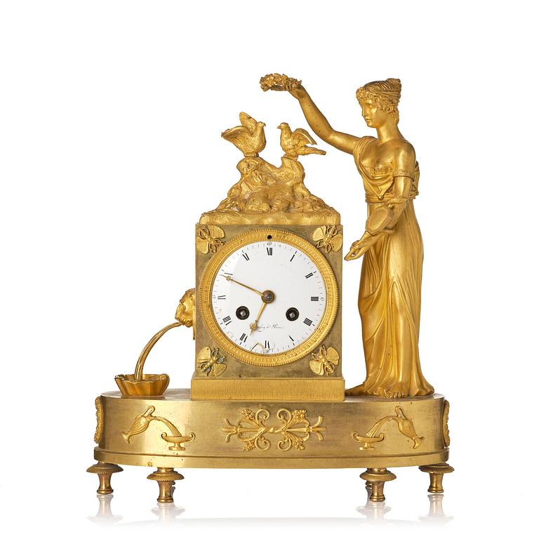 A French Empire figural mantel clock, early 19th century.