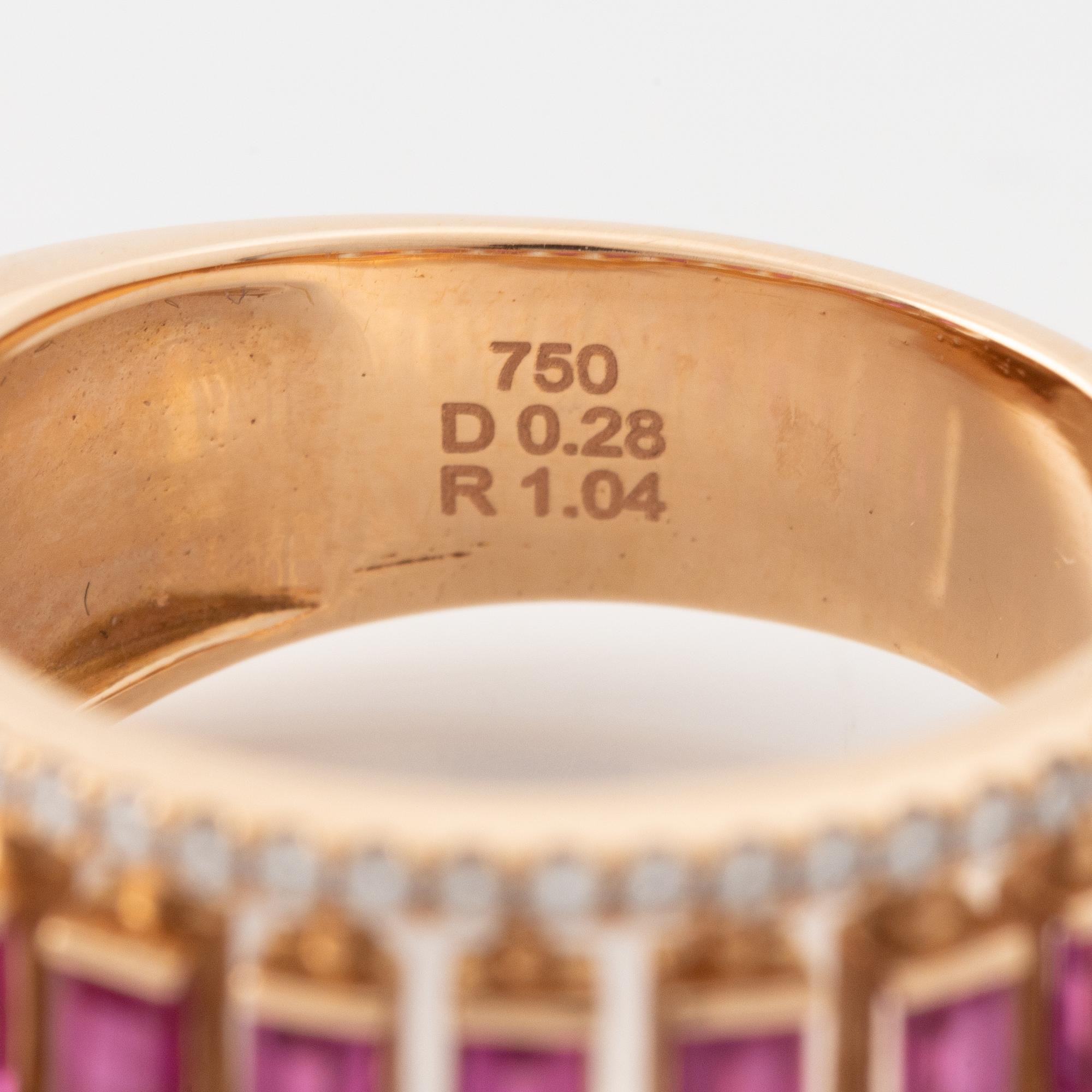Step cut ruby and brilliant cut diamond ring.