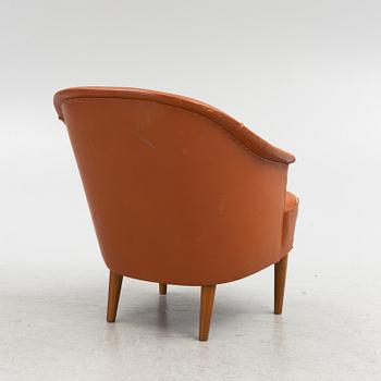 Carl Malmsten, A leather upholstered armchair, model "Lillasyster", O.H. Sjögren, second half of the 20th century.