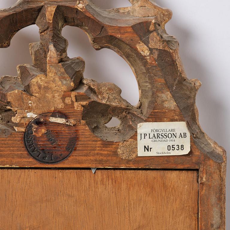 A pair of giltwood one-branch girandole mirrors by JP Larsson.