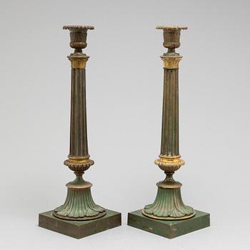 A pair of bronze gustavian candlesticks, late 18th century.