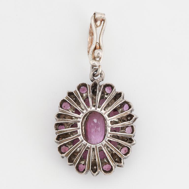 Pink sapphire and brilliant-cut diamond pendant.