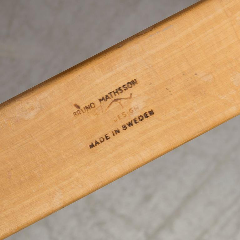 An easy chair with stool by Bruno Mathson.