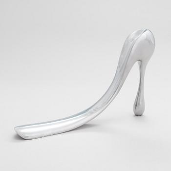 A metal shoe horn by Manolo Blahnik, 2000s.