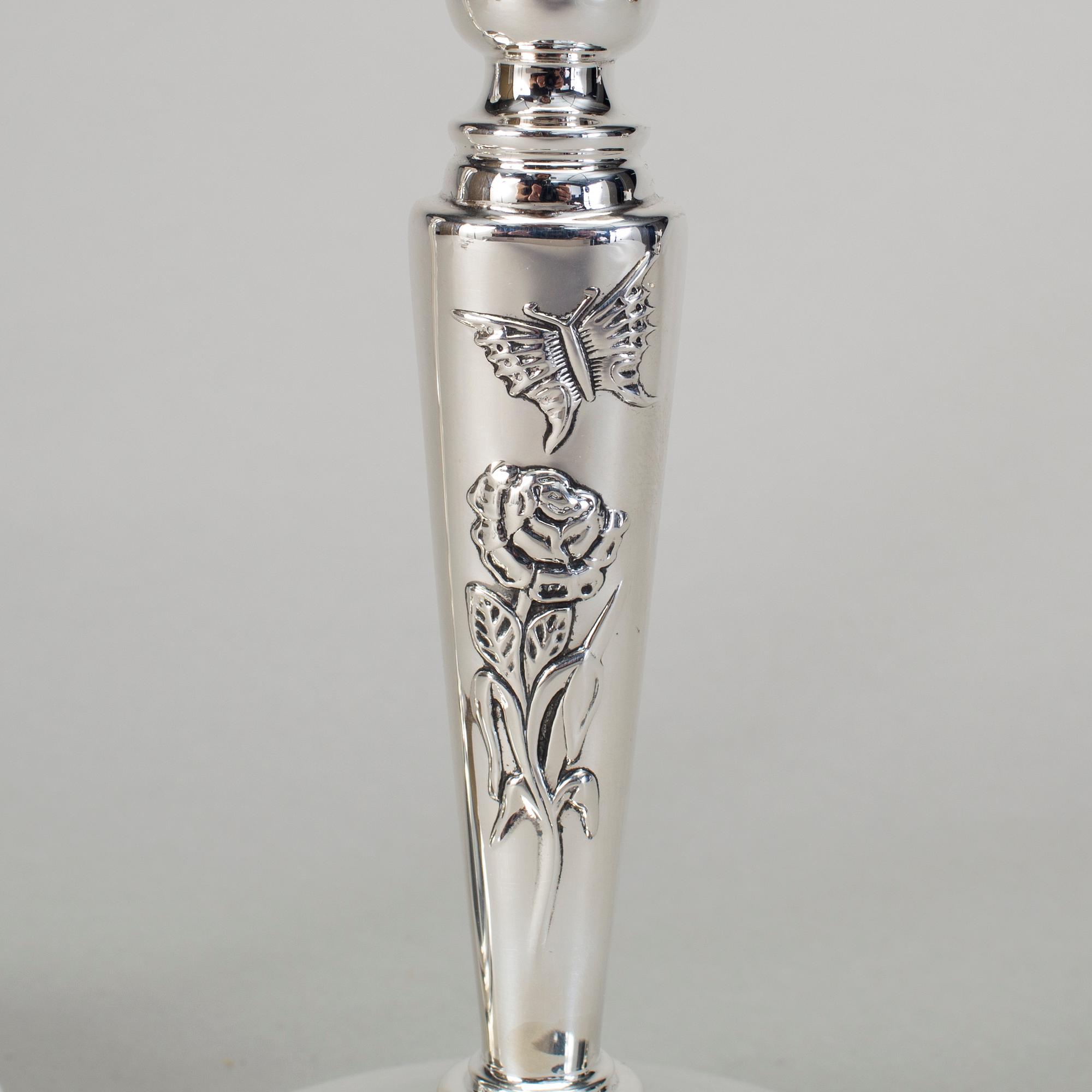 A pair of silver candlesticks by Meya Lerible for Mema, Linköping 1994.