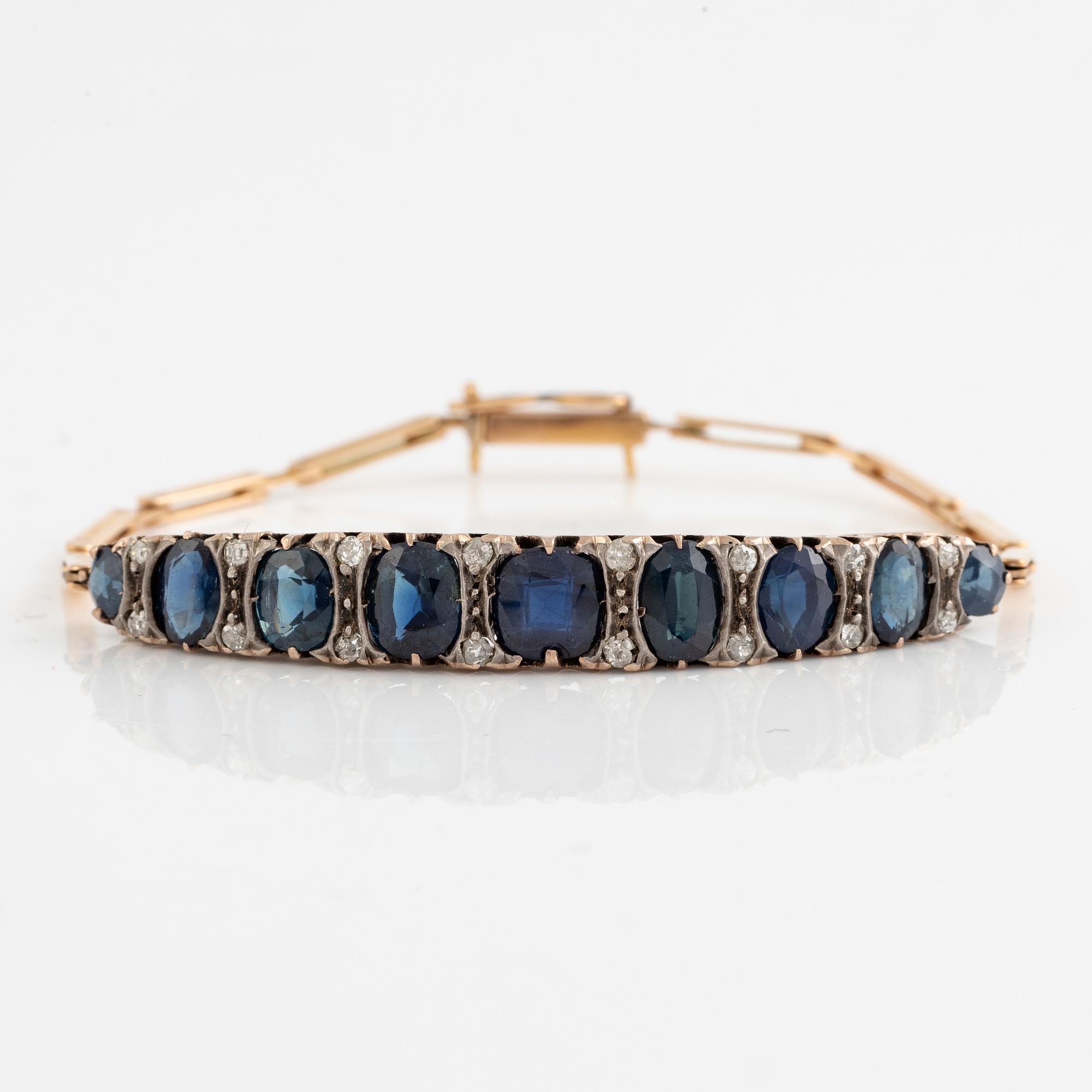 Bracelet 14K gold with dark sapphires and old-cut diamonds.