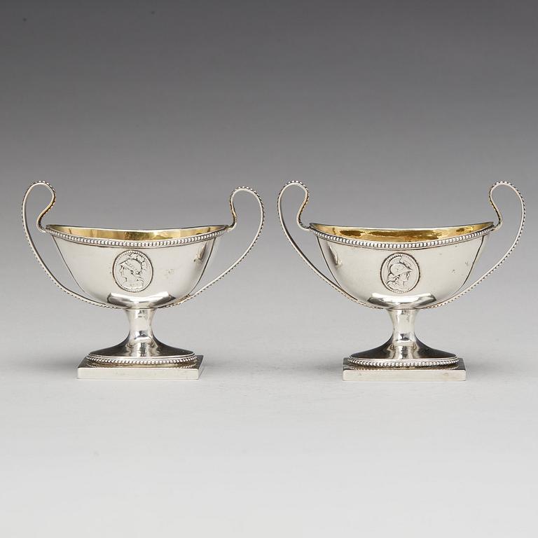 A pair of Swedish late Gustavian parcel-gilt silver salt-cellars, mark of JJ Ulfsberg, Nykoping (1793-1824(-25)).