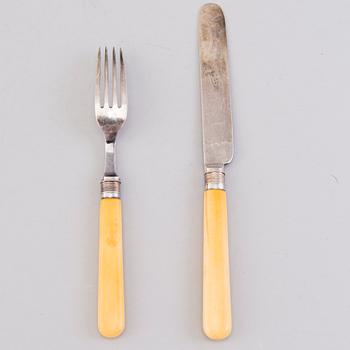 CUTLERY, 12+12, silver with bone handles, Sheffield 1894.
