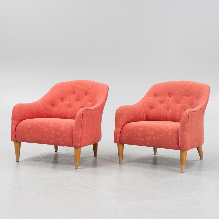 A pair of armchairs, later part of the 20th Century.