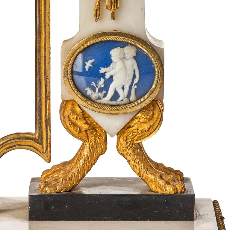 A Louis XVI 18th century mantel clock.