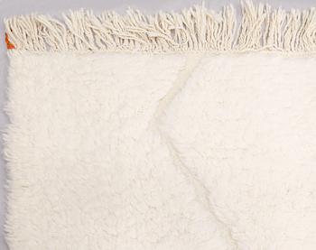 A Moroccan carpet, c 340 x 276 cm.