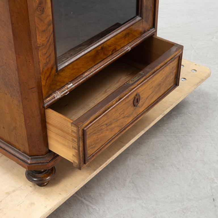 A walnut veneered cabinet, second half of the 19th Century.