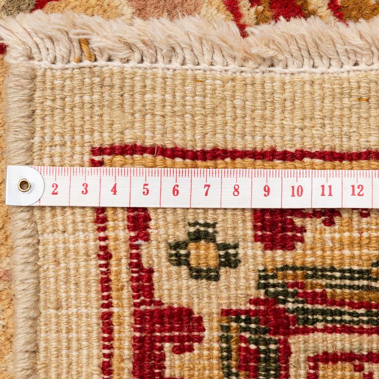 An Antique Amritsar carpet, Northern India, c. 437 x 189 cm.