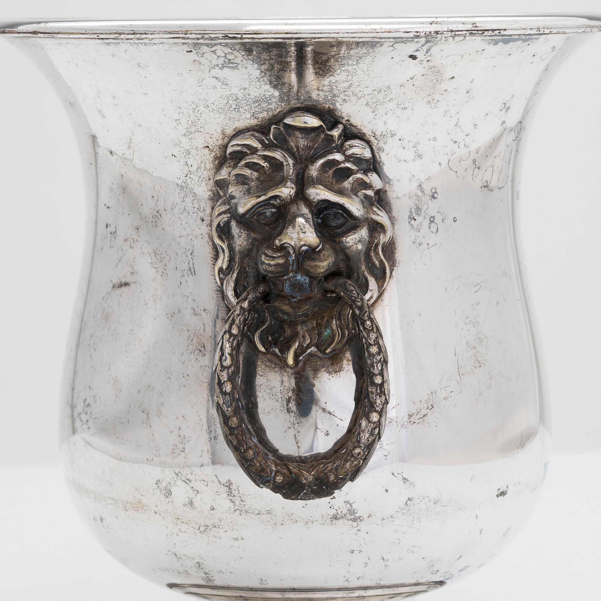 An early 19th century champagne cooler bucket.