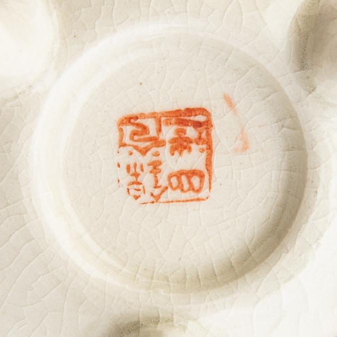 A collection of vases, bowls, and boxes 10 dlr Japan 20th century.