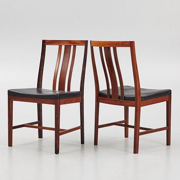 Bertil Fridhagen, a rosewood-veneered dining table with four chairs, BOdsfors, Sweden, 1960's.