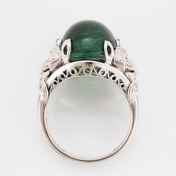 18K white gold diamond and green cabochon-cut tourmaline cocktail ring.