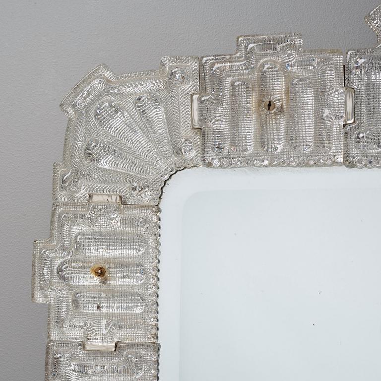 Carl Fagerlund Attributed to, A Swedish Moderna glass framed wall mirror, Orrefors, Sweden 1940's.