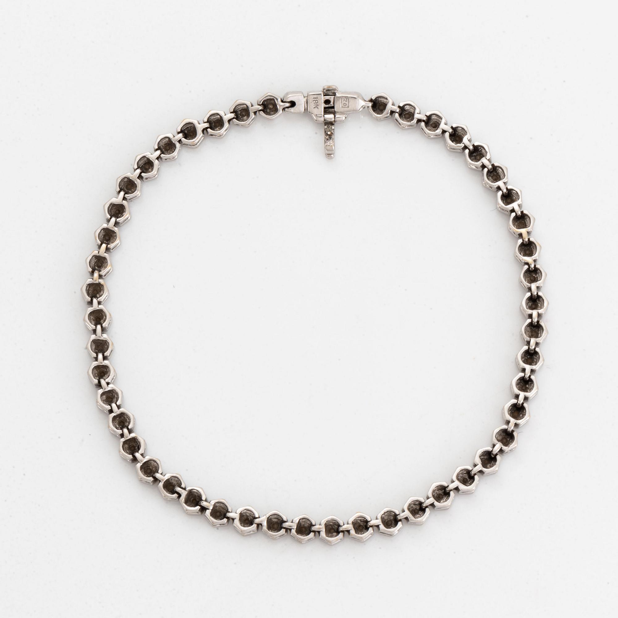 Tennisarmband, vitguld och briljantslipade diamanter.