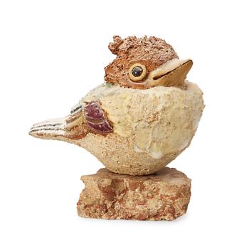 A Tyra Lundgren stoneware figure of a bird, dated 1968.