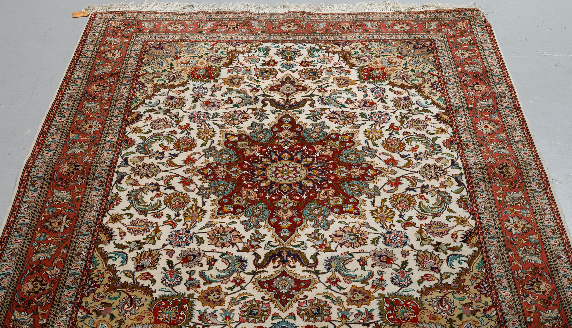 A rug, Old Tabriz, part silk, ca204 x 152 cm.
