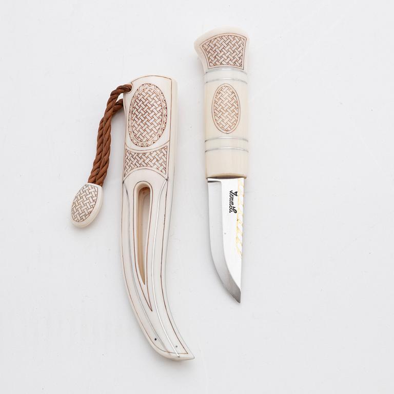 A mammoth tusk knife by Bertil Fällman, signed.