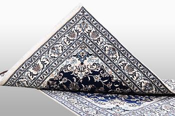 A carpet, Nain, part silk, ca 202 x 148 cm.