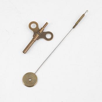 A Swedish Empire giltwood mantel clock by E. Engelbrechten (watchmaker active in Stockholm 1815-45).