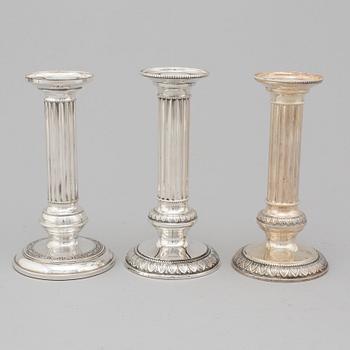 Three Finnish silver candlesticks, 1989-97.