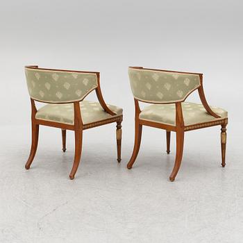 A pair of chairs, first half of the 20th century. Empire style.