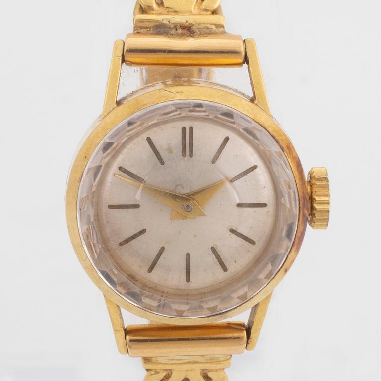 18K gold ladies watch.