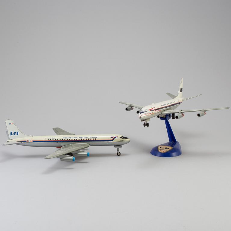 Two tinplate toy planes by Tomiyama and Arnold, Japan and Germany, 1960s.