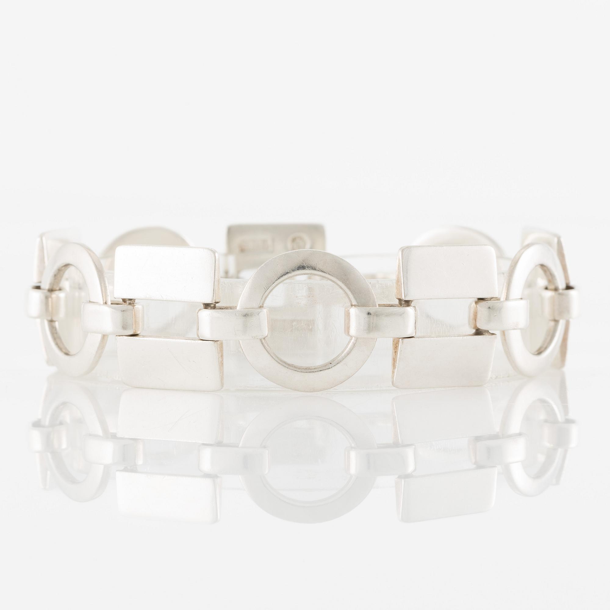 Sven-Erik Högberg, arm link, silver.