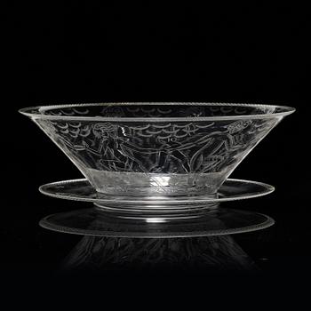 Edward Hald, an engraved glass bowl with plate, Orrefors, Sweden, 1926, model 305, engraved by Emil Goldmann.