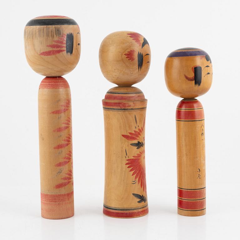 Four Japanese Kokeshi dolls, 20th Century.