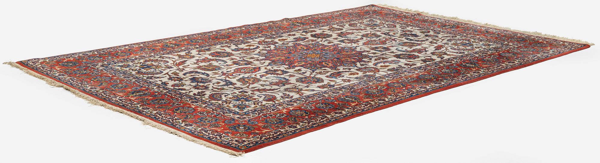 A semi-antique Isfahan carpet, central Persia, c. 314 x 197 cm.