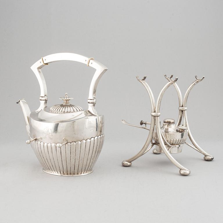 A swedish silver teapot with stand, K Andersson, Stockholm 1905.