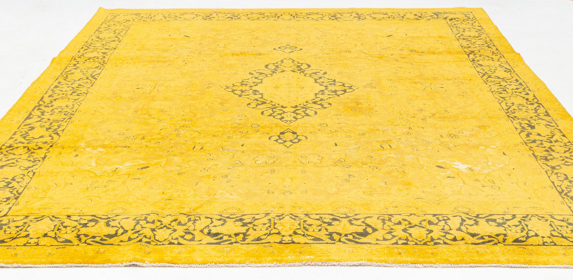 A Kirman carpet of 'vintage' design, c 382 x 293 cm.