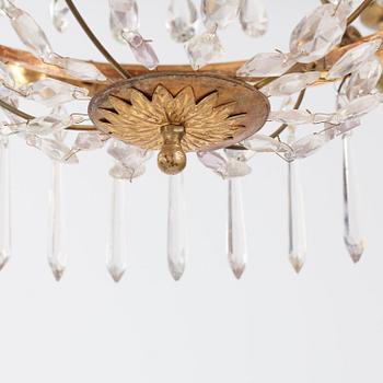 A late Gustavian four-light chandelier, early 19th century.