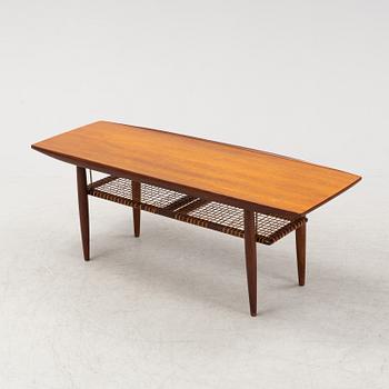 A teak and rattan coffee table model 'Aarup', IKEA, designed in 1959.