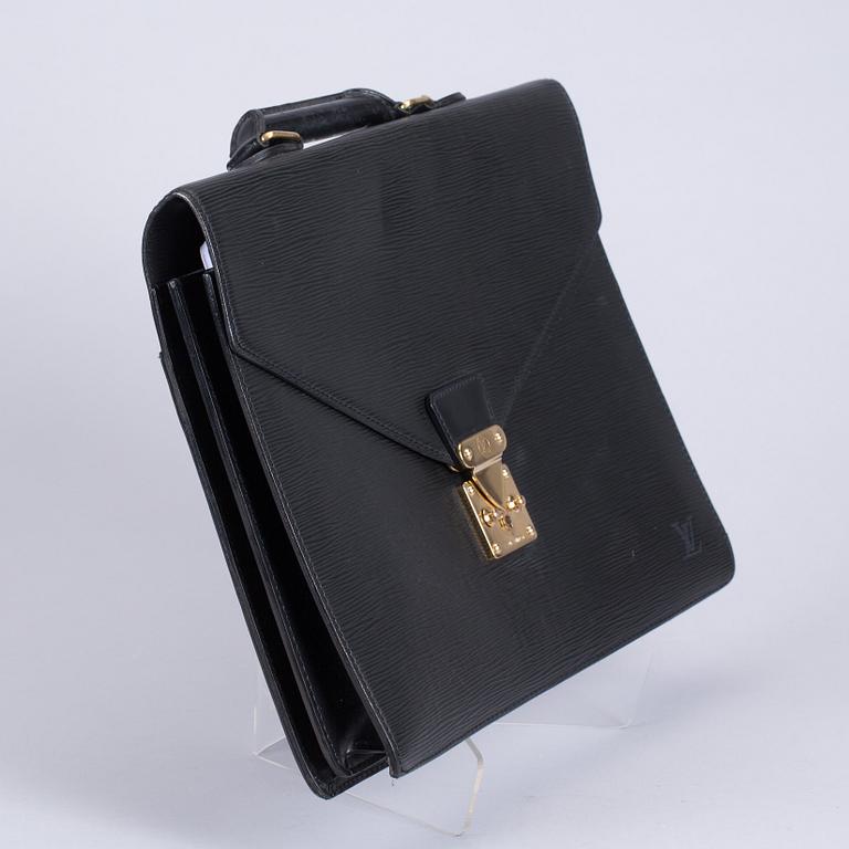 PORTFÖLJ, "Serviette conseiller ambassadeure Epi", Louis Vuitton.