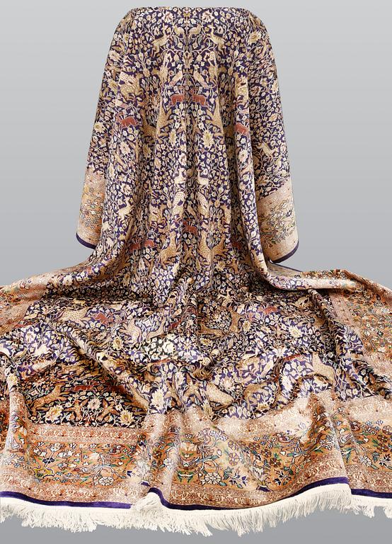 A carpet, figural silke Kashmir, ca 560 x 360 cm.