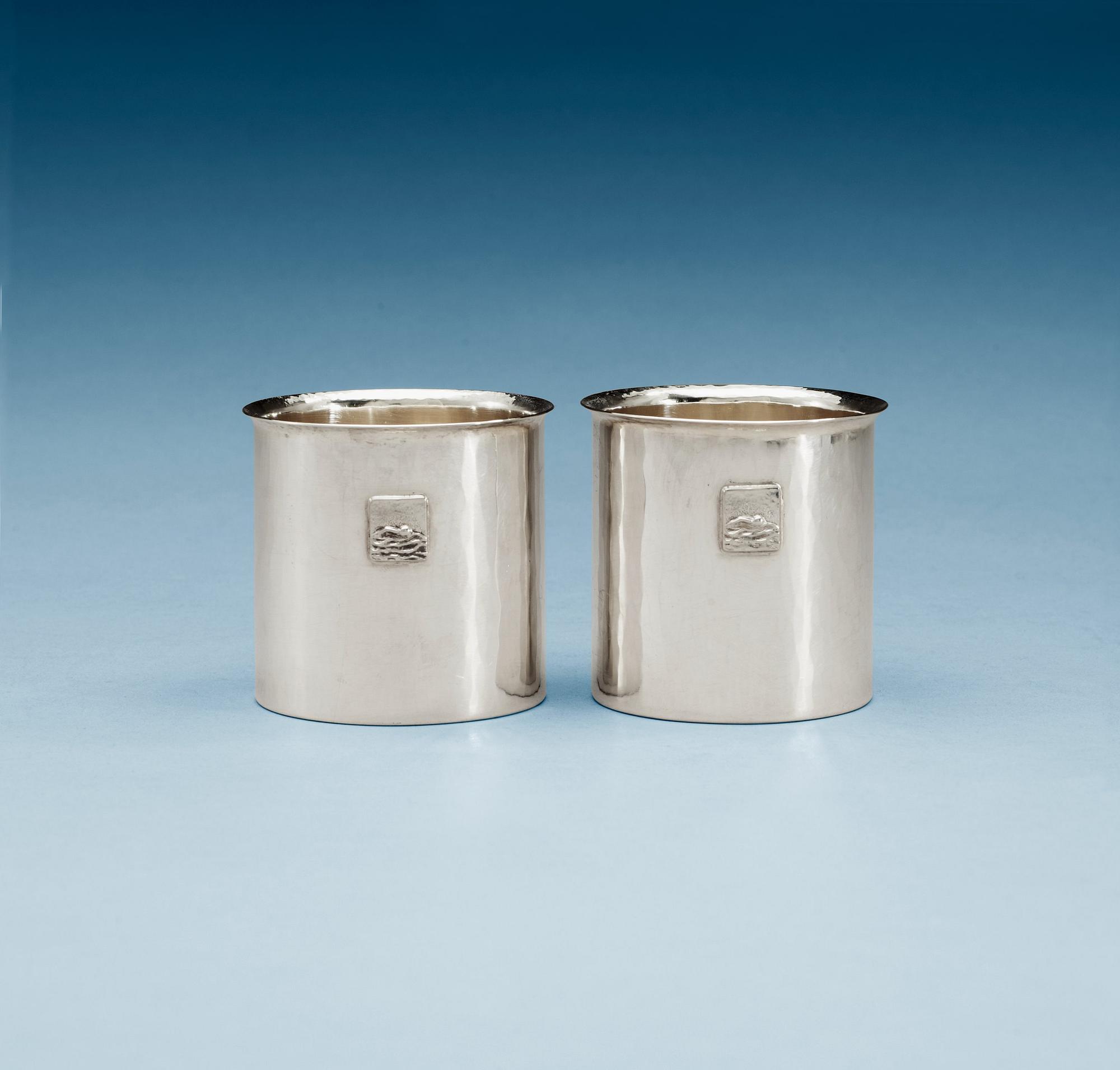 Two Olle Ohlsson sterling beakers. Stockholm 1992. (2).